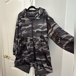 Raincoat gray camouflage jacket with hood.